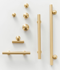 Brushed gold round leg furniture handle