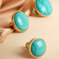 Brass furniture knob set with a natural turquoise stone