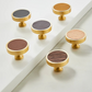 Brushed gold furniture knob with insert