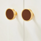 Brushed gold furniture knob with insert
