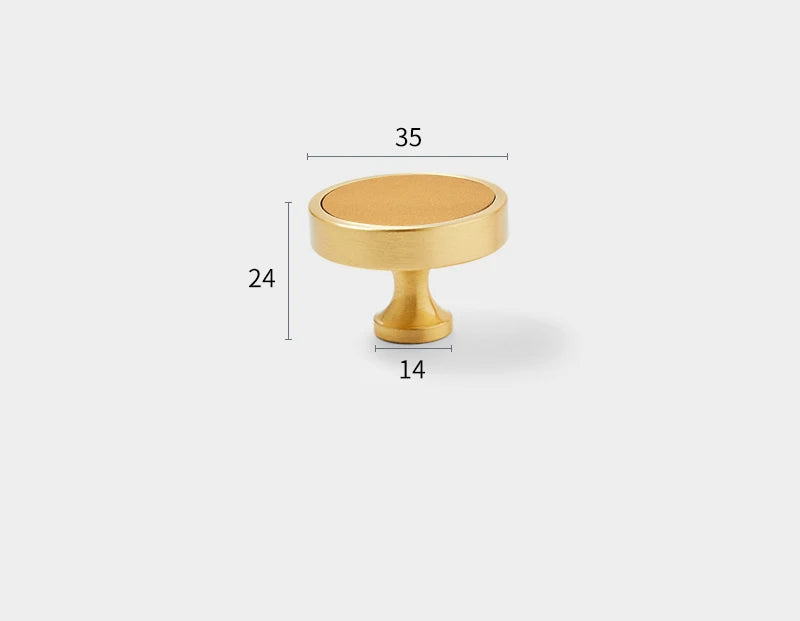 Brushed gold furniture knob with ochre insert