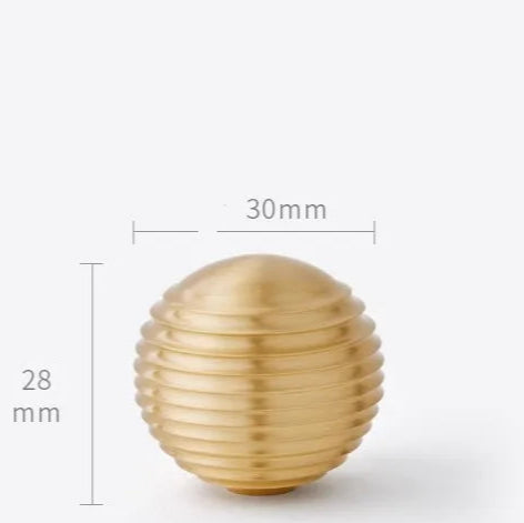 Bouton de meuble sphérique nervuré or brossé