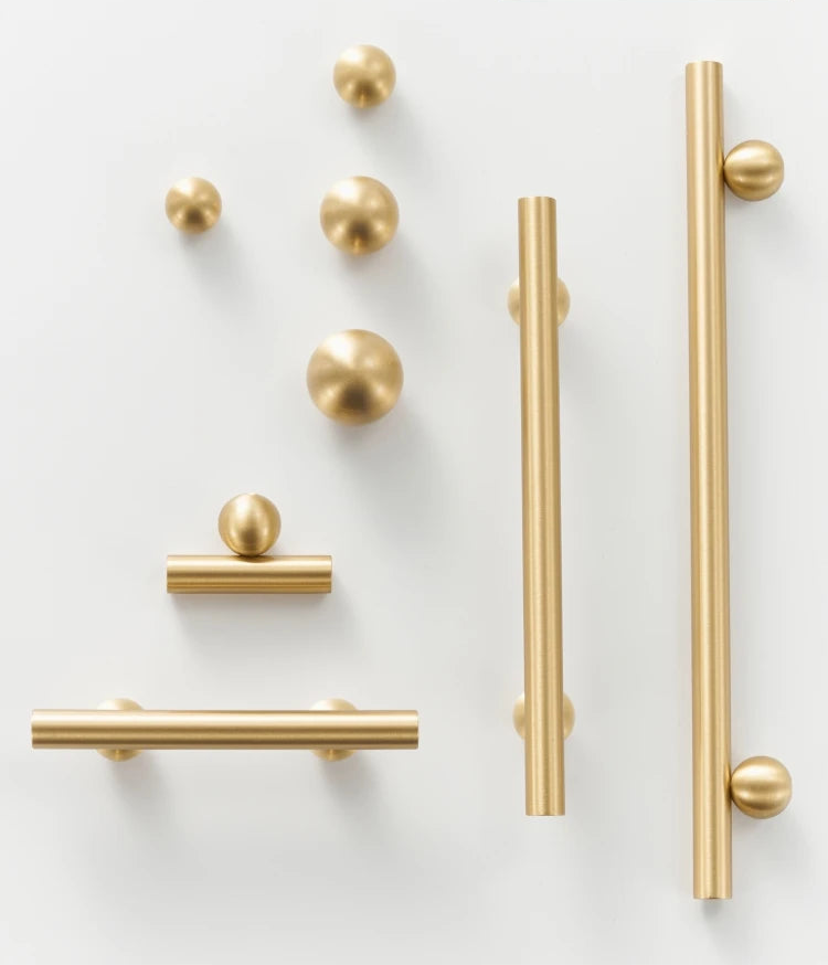 Brushed gold round leg furniture handle