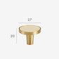 Brass and cream furniture handle