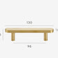 Brass and cream furniture handle