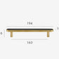 Brass and black furniture handle