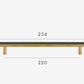 Brass and black furniture handle