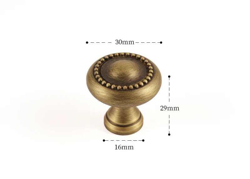 Poignée de meuble ancienne effet bronze