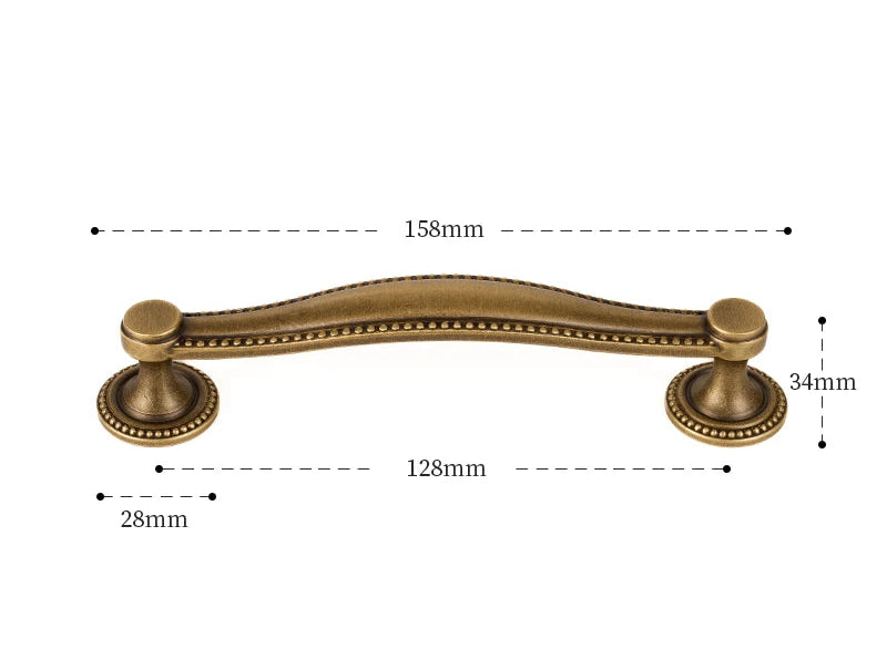 Poignée de meuble ancienne effet bronze