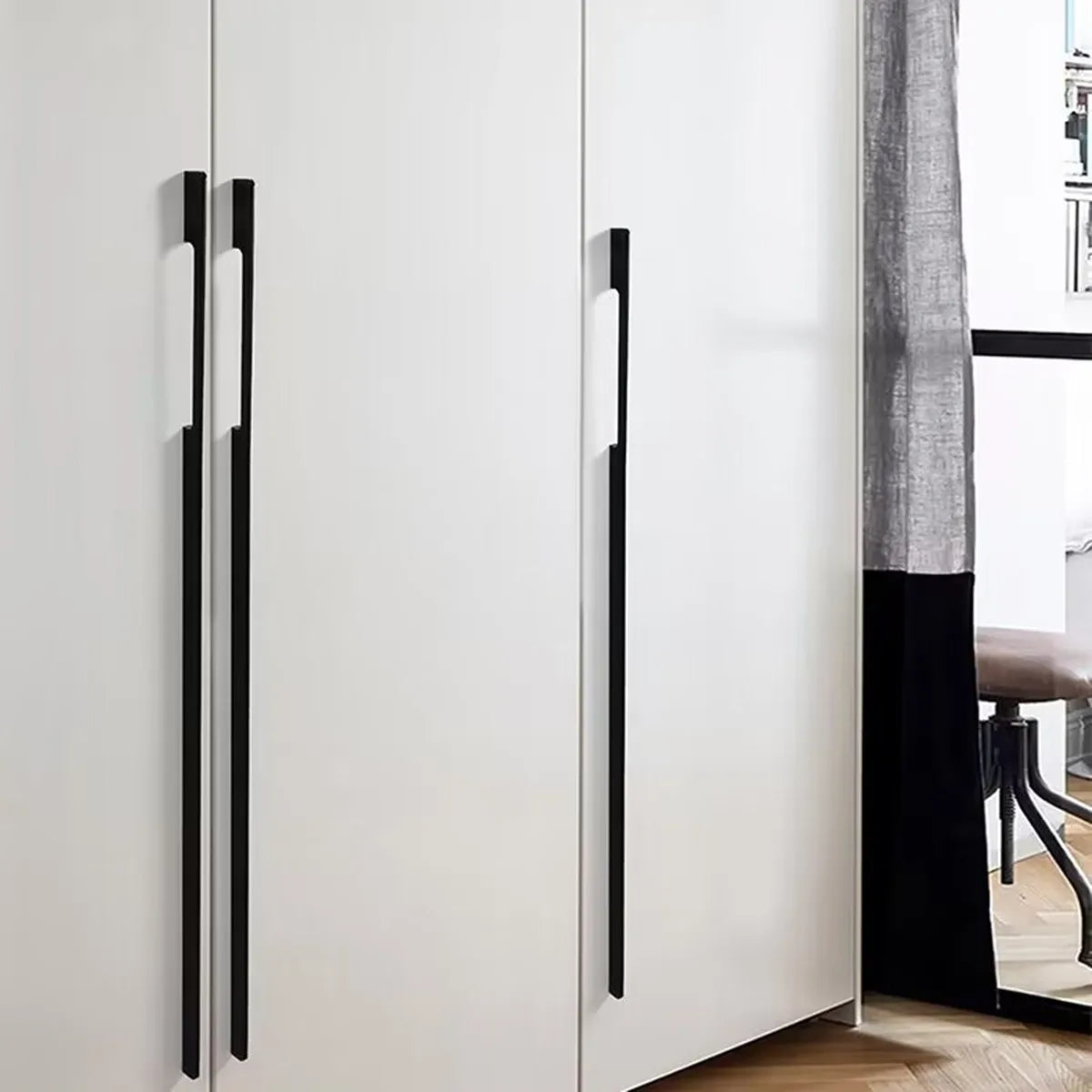Black rectangular furniture handle