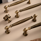 Twisted brass furniture handle, bronze effect