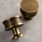 Twisted brass furniture handle, bronze effect