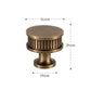 Twisted brass furniture handle, bronze effect