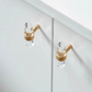 Clear and brushed gold furniture handle