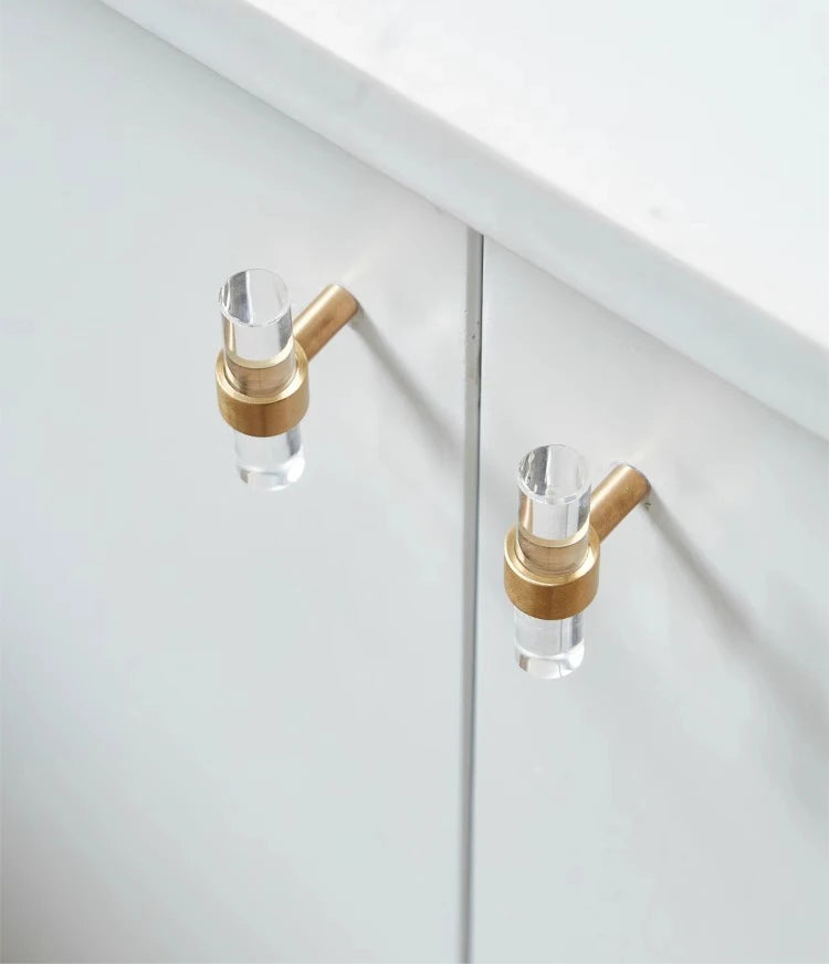 Poignée de meuble transparente et or brossé