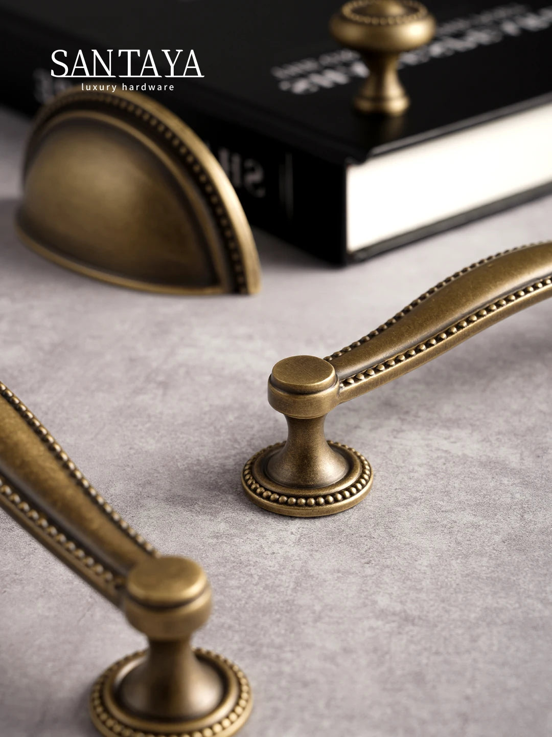 Poignée de meuble ancienne effet bronze