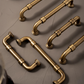 Poignée de meuble originale en laiton, effet bronze